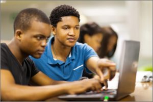 African College Students Using a Laptop Together